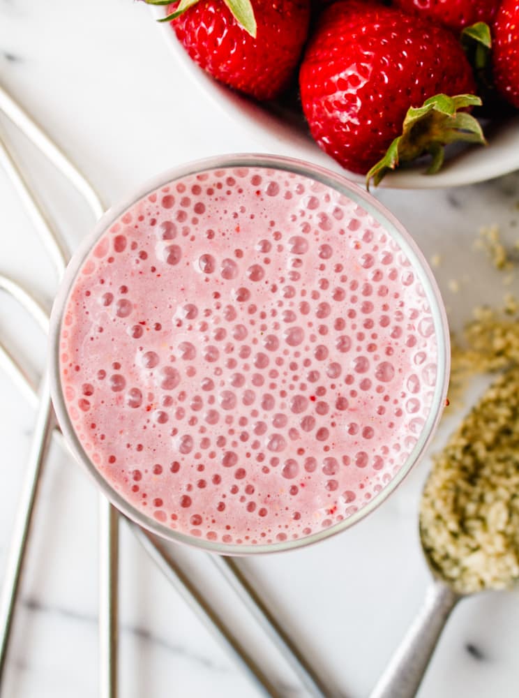 strawberry hemp milkshake in a glass.