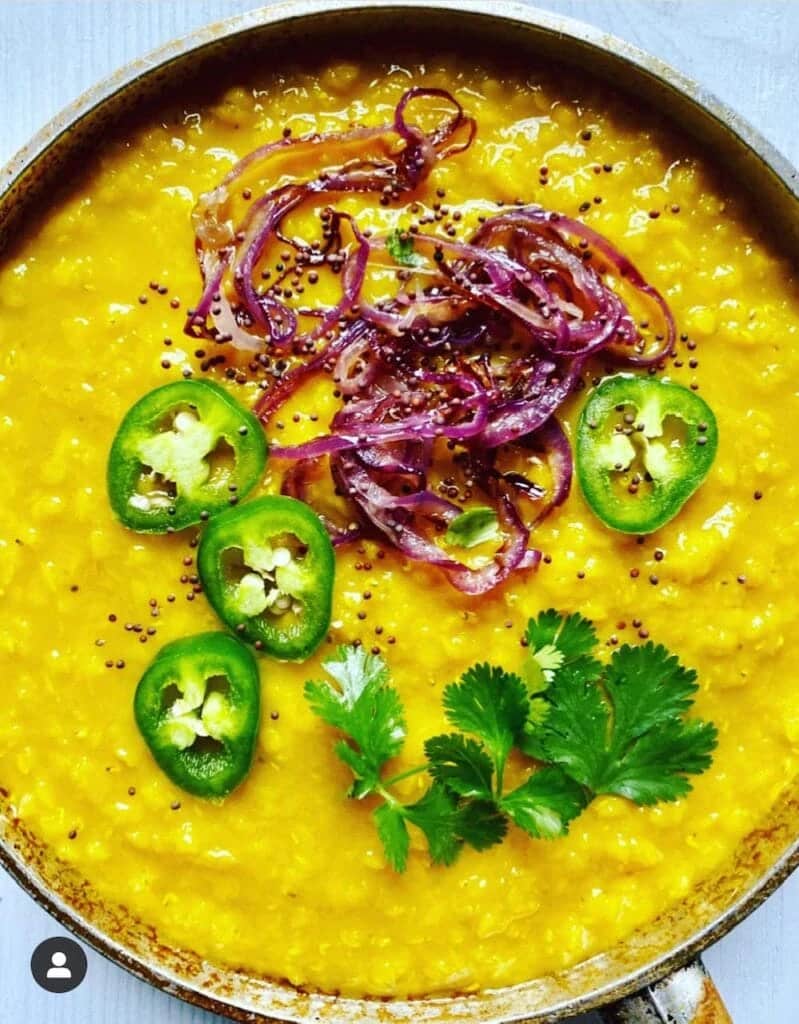 Healthy dinner recipes of red lentil dahl in a dish.