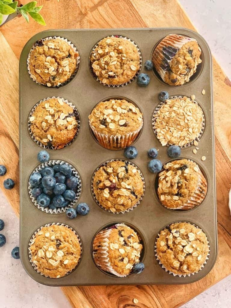 blueberry banana oatmeal muffins in a tin.