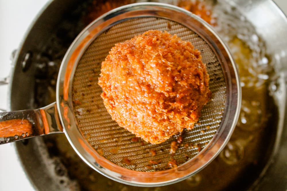 a ball of coxinhas hot from the oil.
