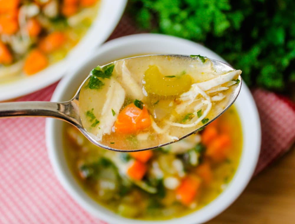 a spoonful of chicken vegetable soup.