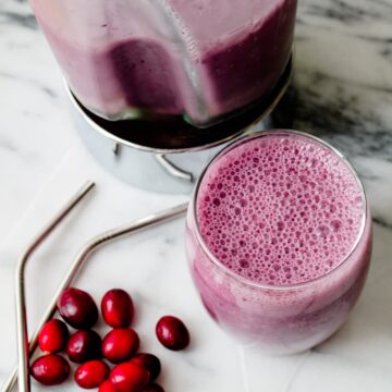 cranberry smoothie in a glass.