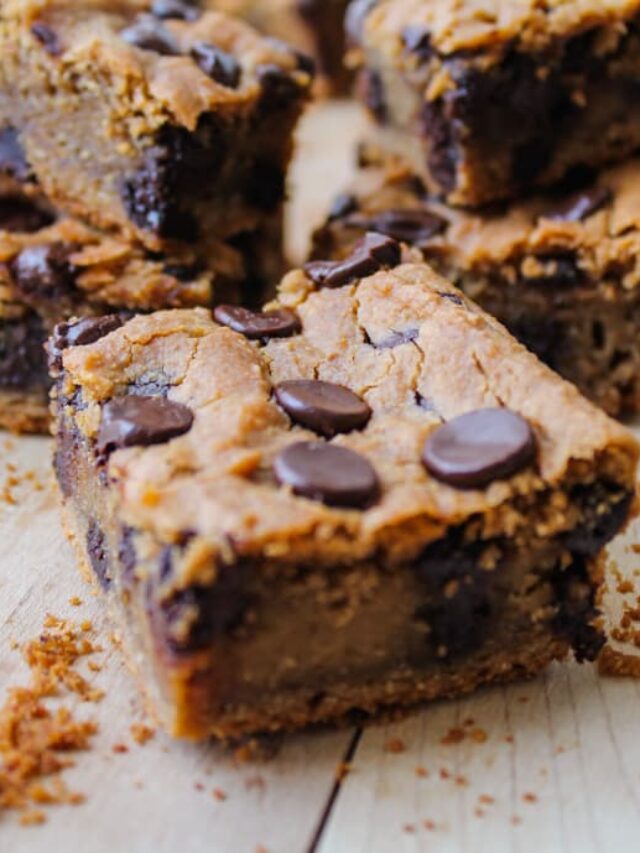 a cutting board with gluten free blondies.