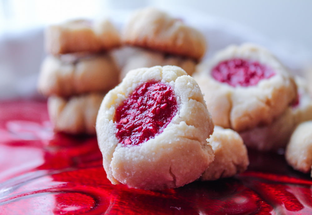 A tray of freshly baked vegan thumbprint cookies.