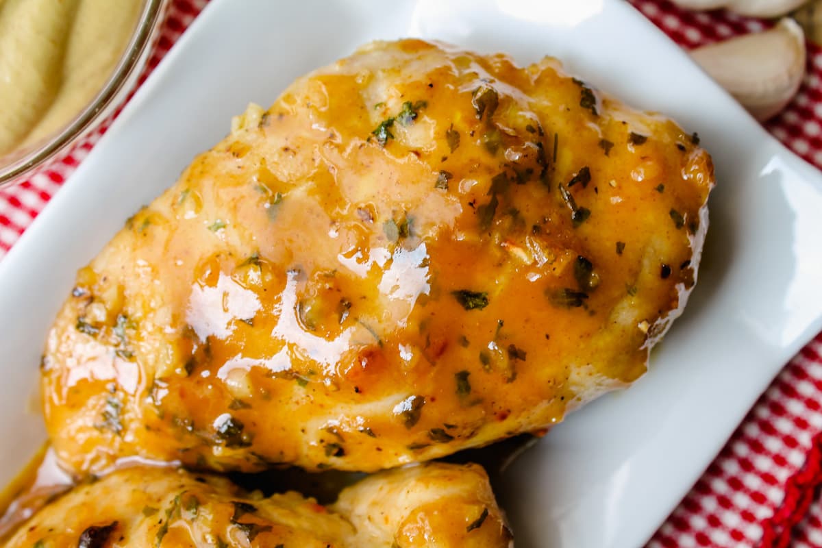 Maple dijon chicken on a plate.