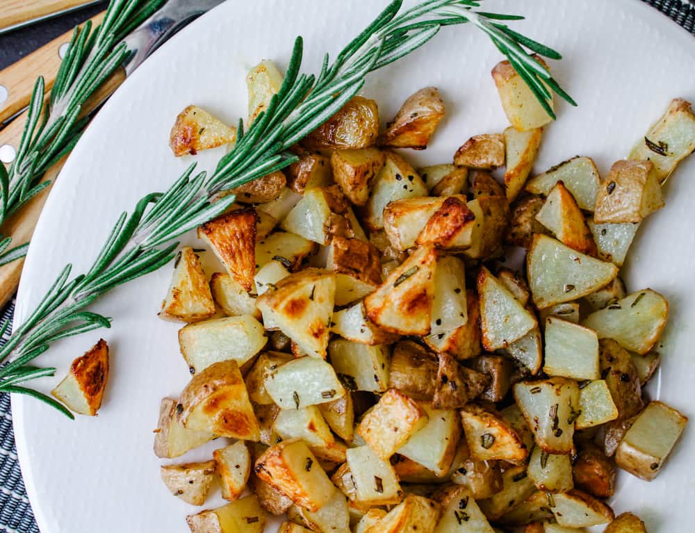 a plate of roasted rosemary potatoes.