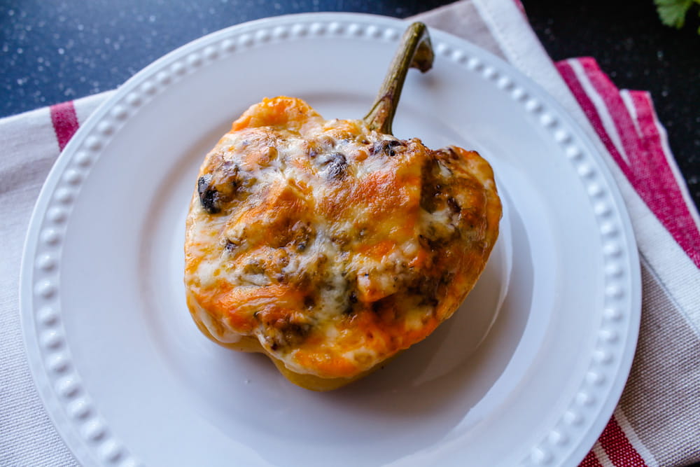 vegetarian stuffed peppers on a plate.