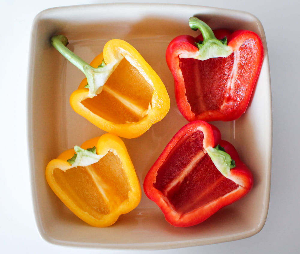 bell peppers in a baking dish.