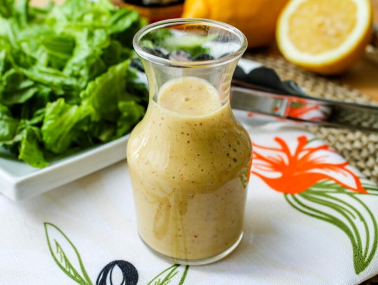 A jar of honey mustard vinaigrette dressing.