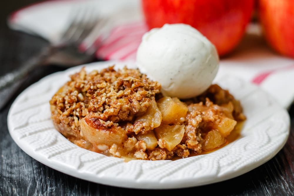 a plate of instant pot apple crumble.