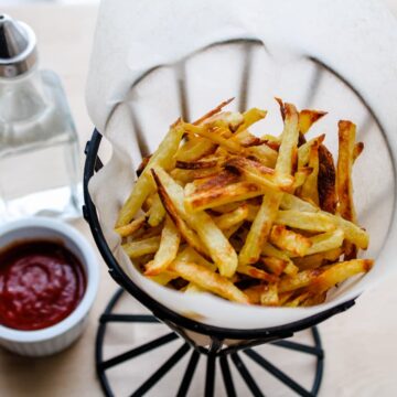 a basket of oven baked fries.