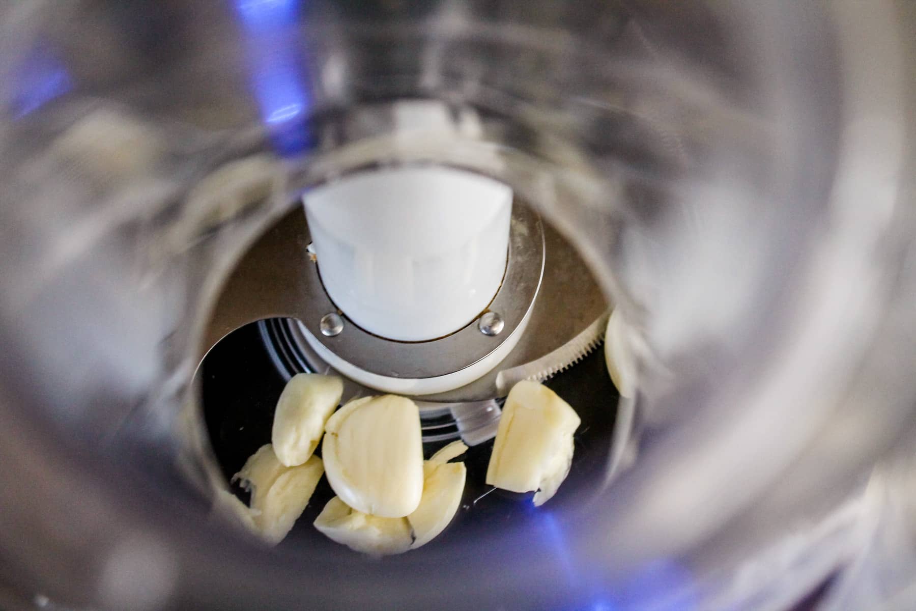 cloves of garlic in a food processor.