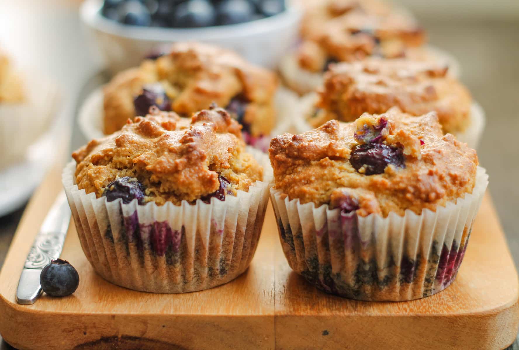 a plate of almond flour blueberry muffins.