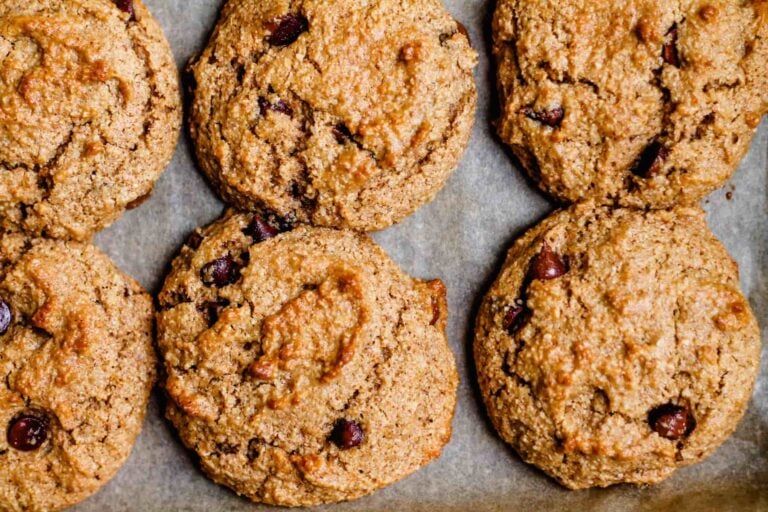 Freshly baked cookies on a baking sheet.