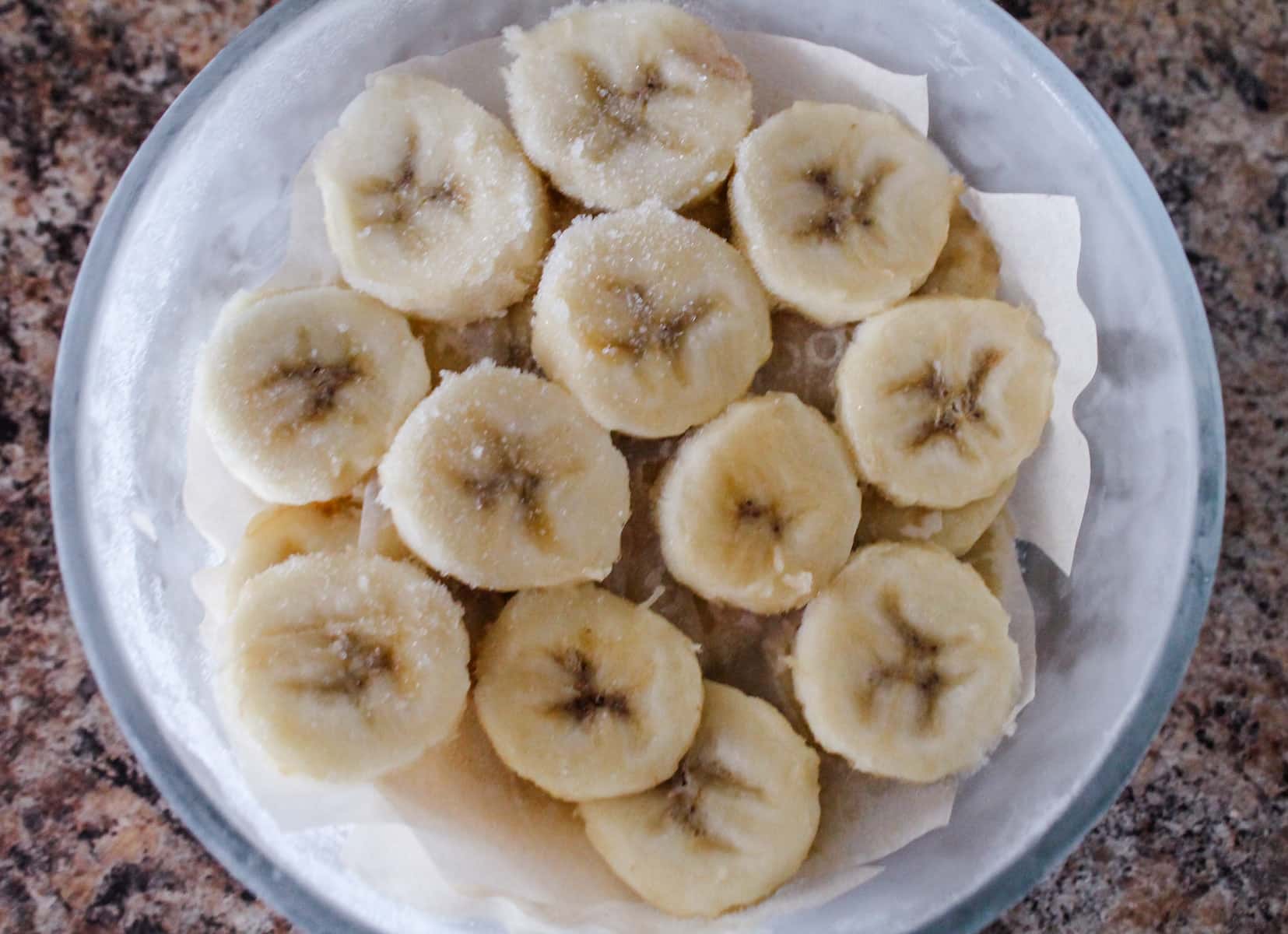 frozen slices of banana in a container.