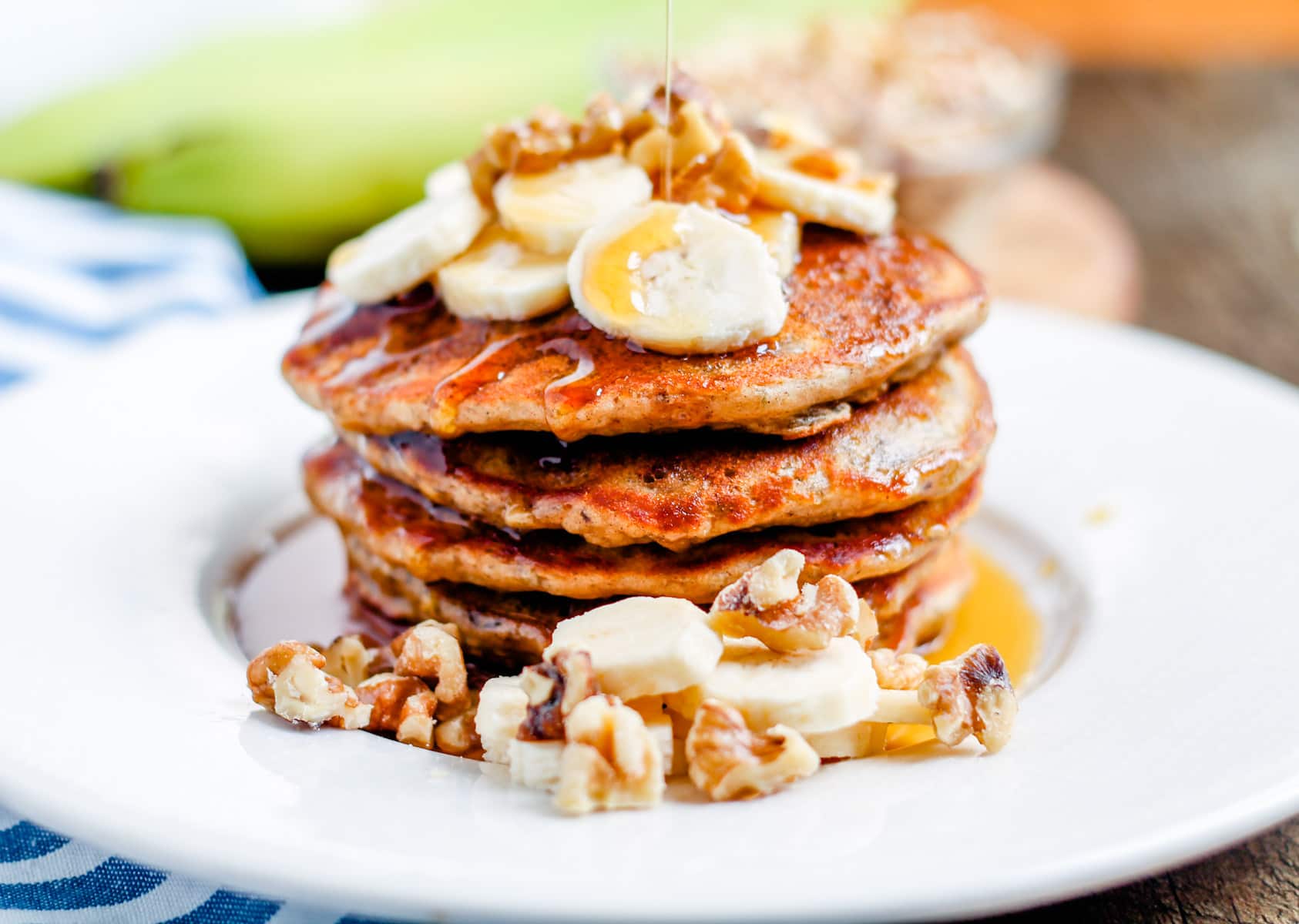 a stack of banana nut pancakes on a plate.