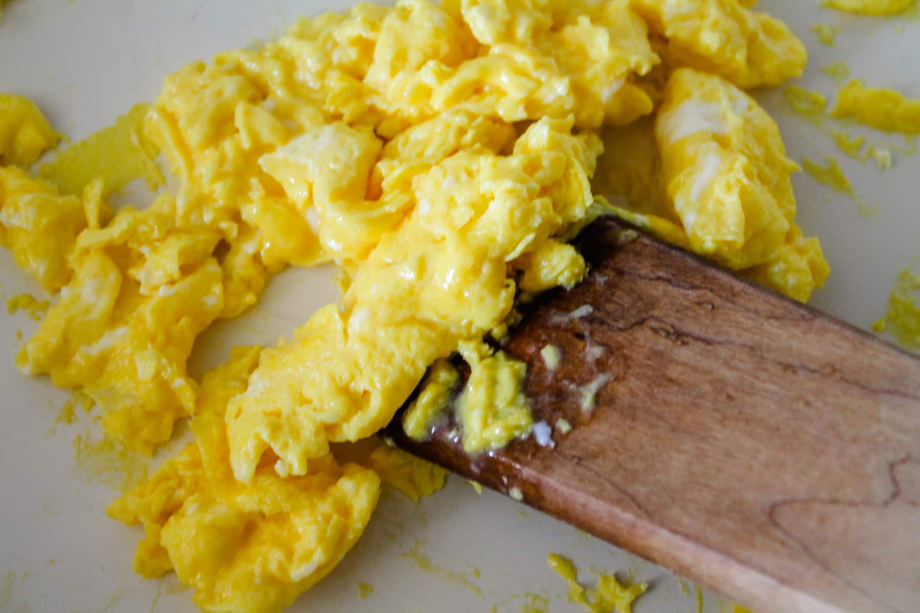 scrambled eggs in a pan.