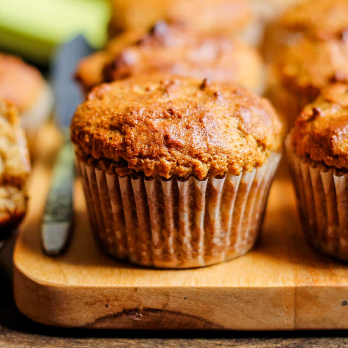 banana protein muffins on a board.