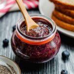 a small jar of blueberry chia jam.