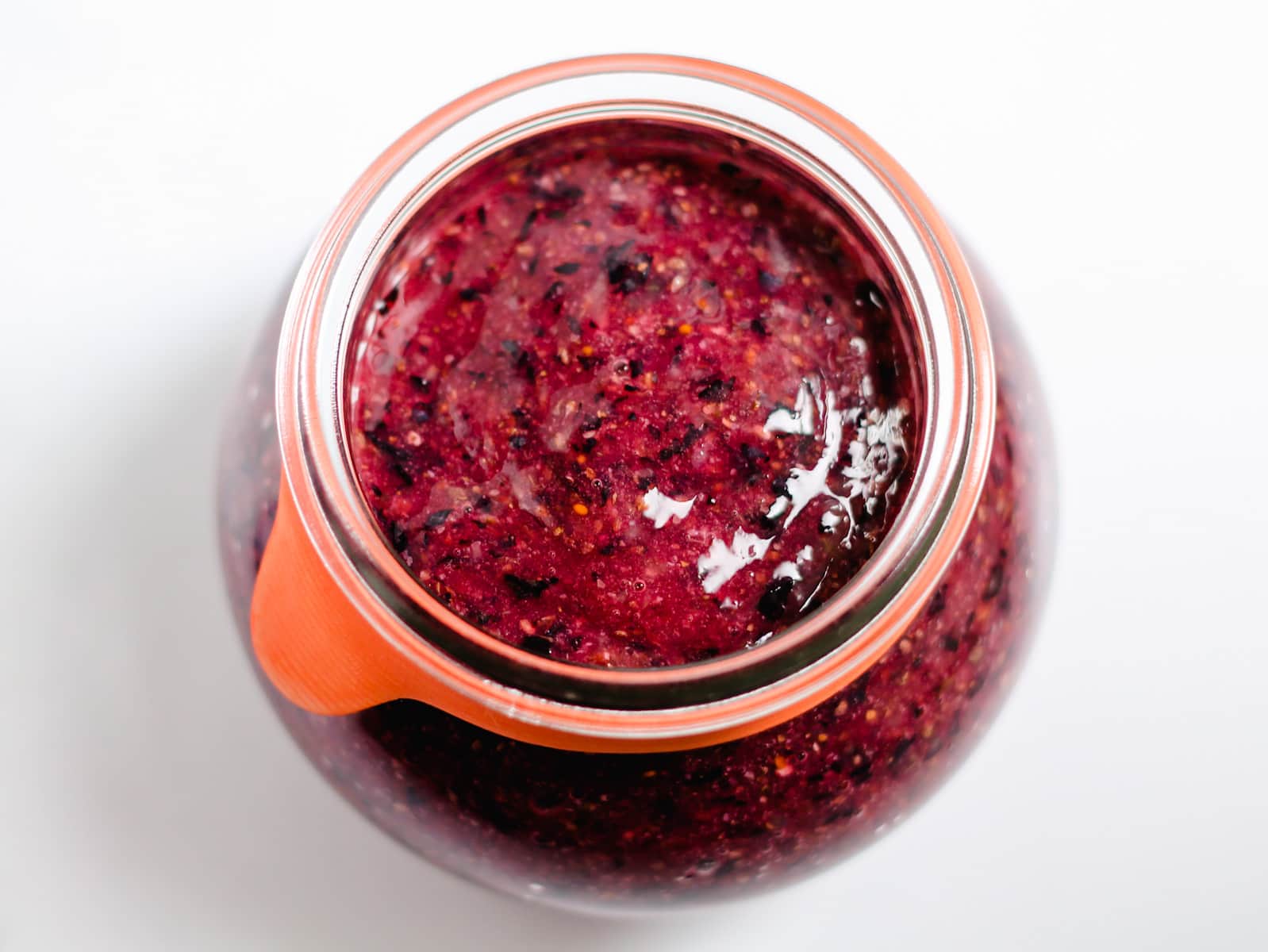a jar of freshly blended blueberry chia jam.