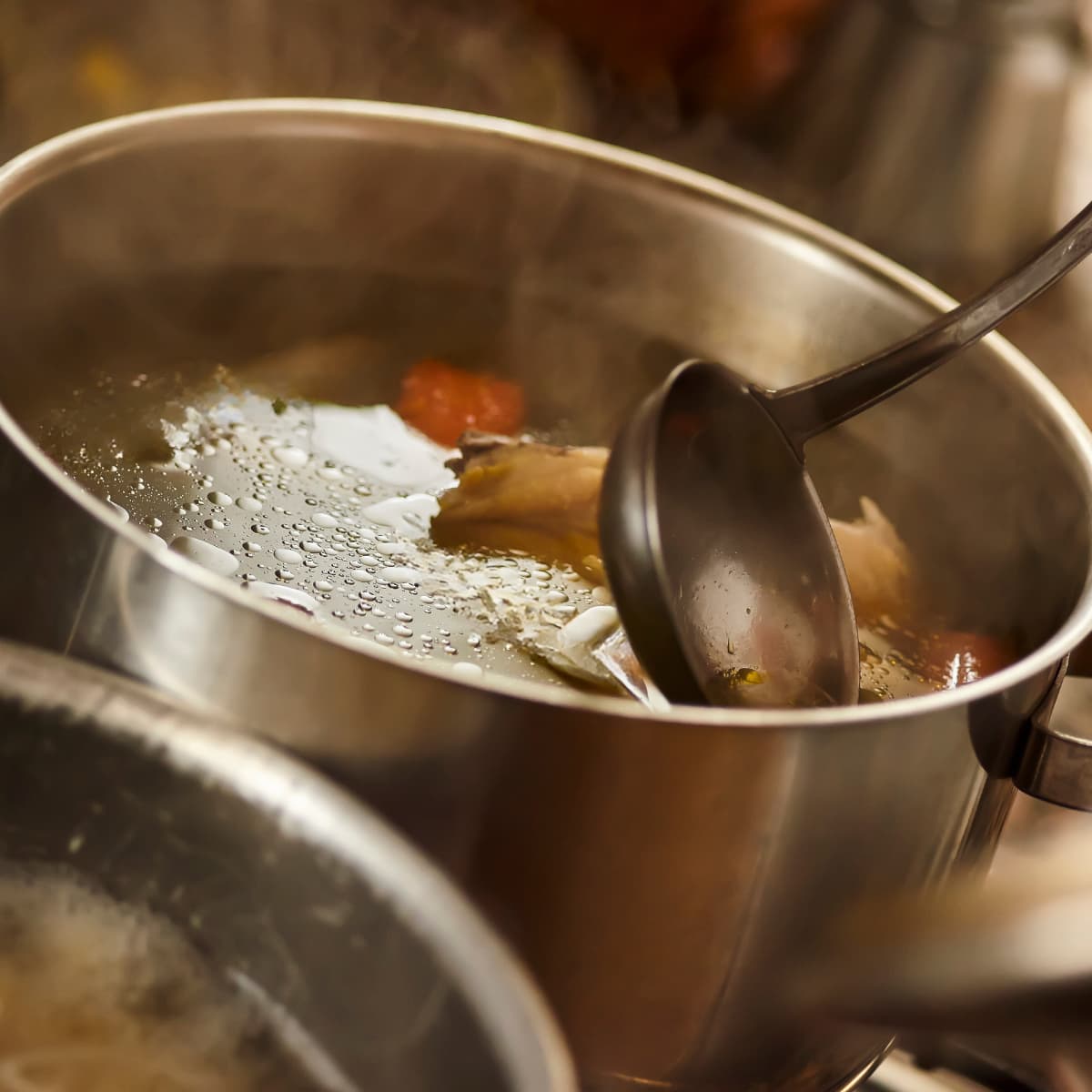 a pot simmering on the stove.