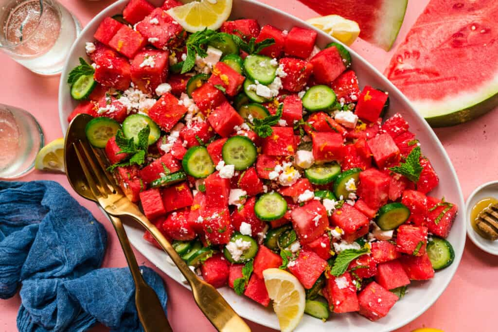 a bowl of watermelon cucumber salad.