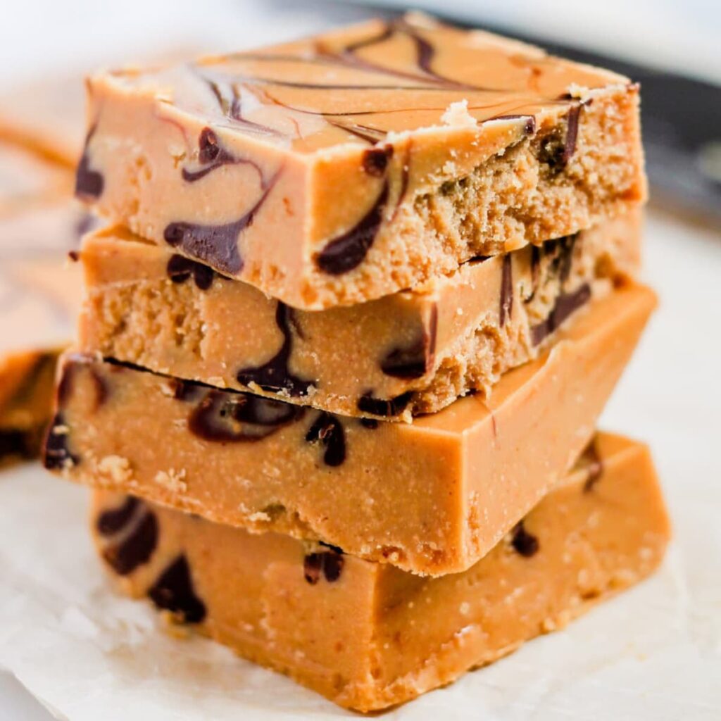 a stack of pieces of coconut oil fudge.