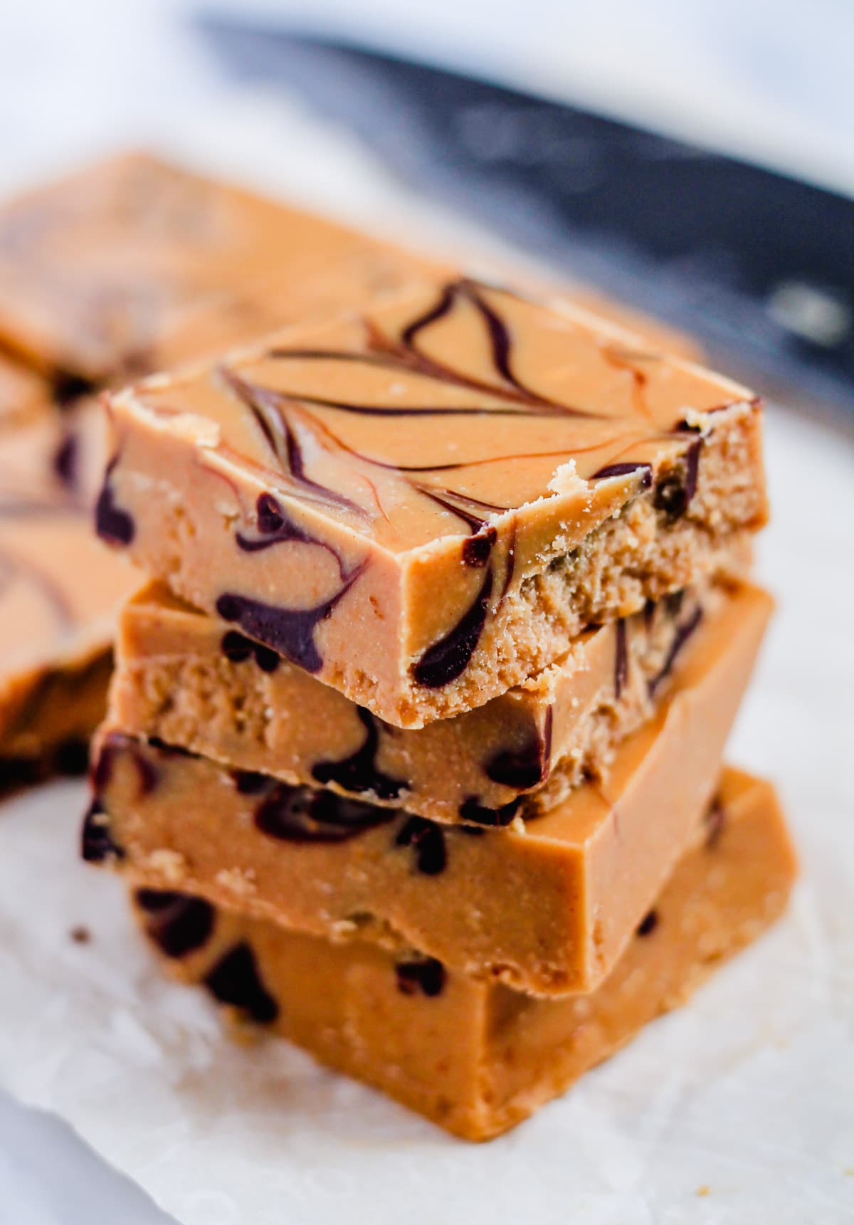 pieces of healthy peanut butter fudge on a counter.
