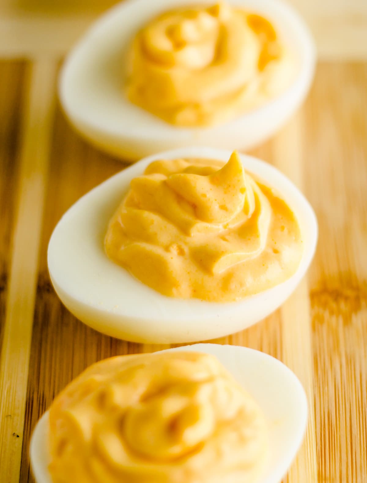 a serving tray of hummus deviled eggs.
