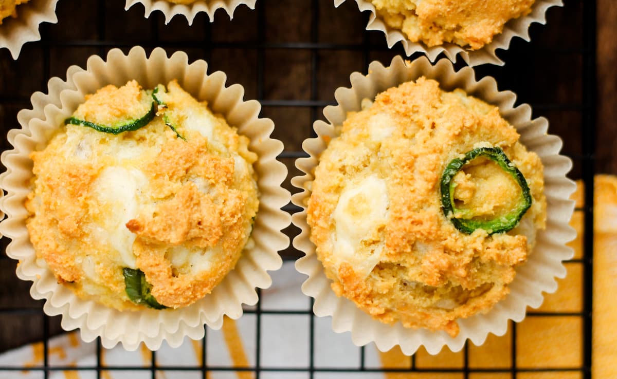 jalapeno muffins on a wire rack.