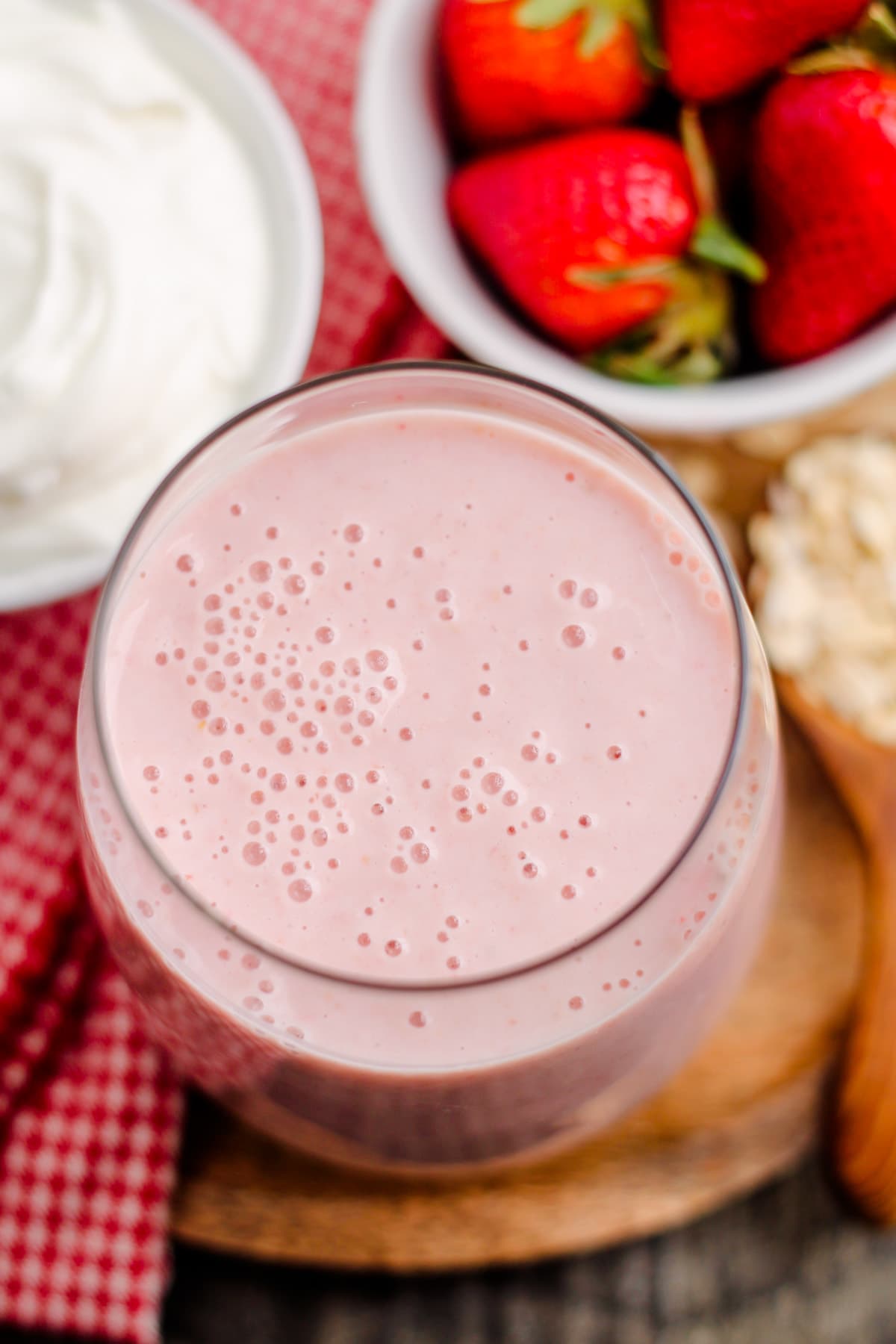 overhead image of strawberry banana oatmeal smoothie.