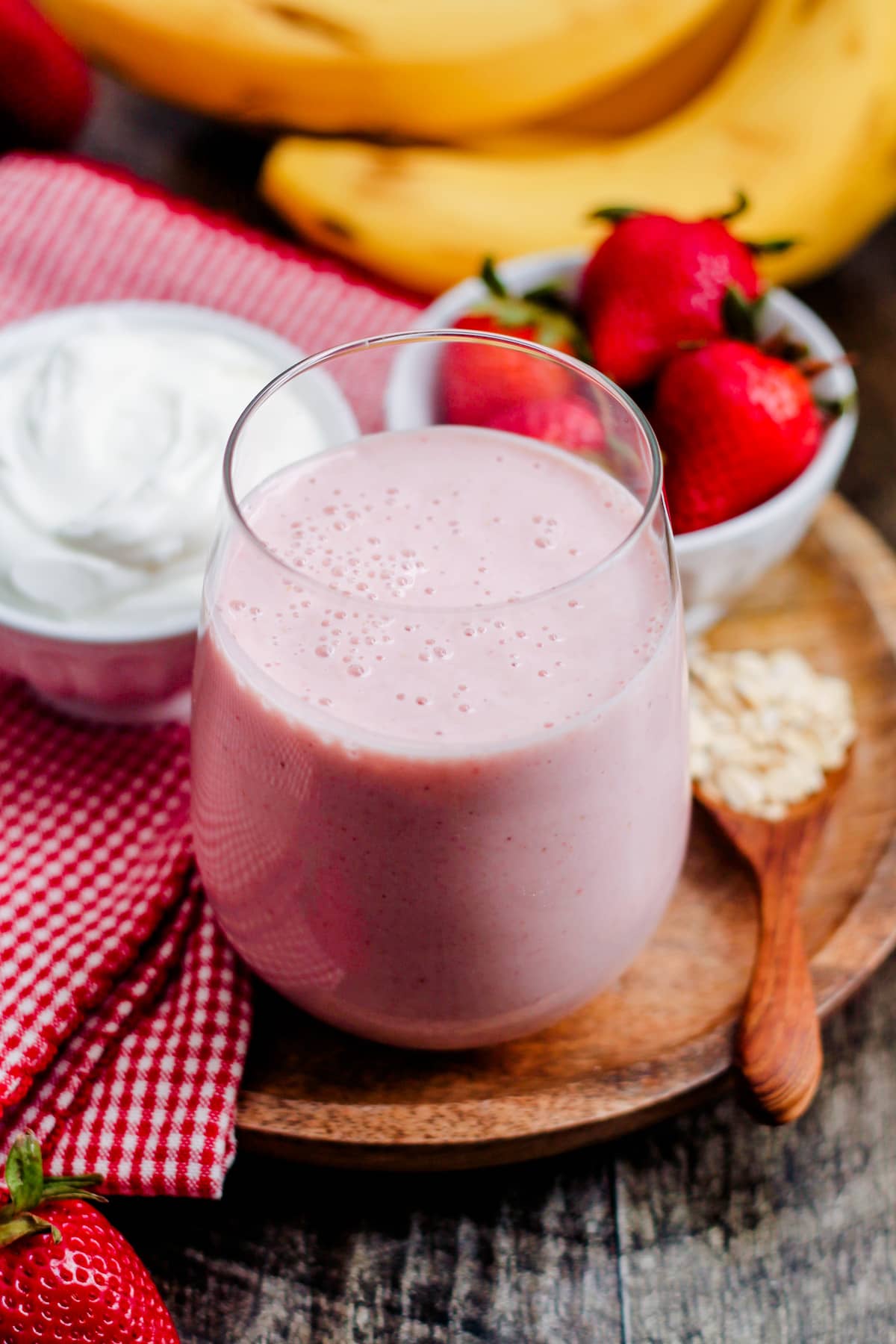 strawberry banana oatmeal smoothie in a glass.