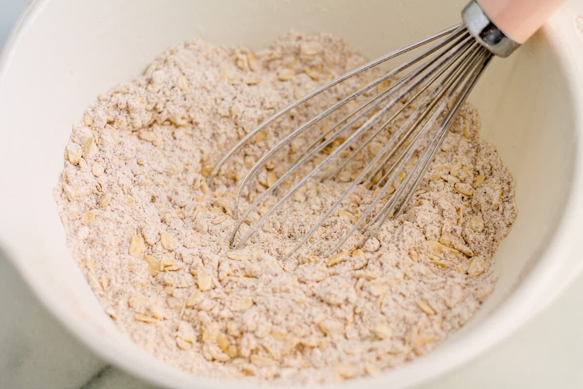 dry ingredients in a bowl being whisked.