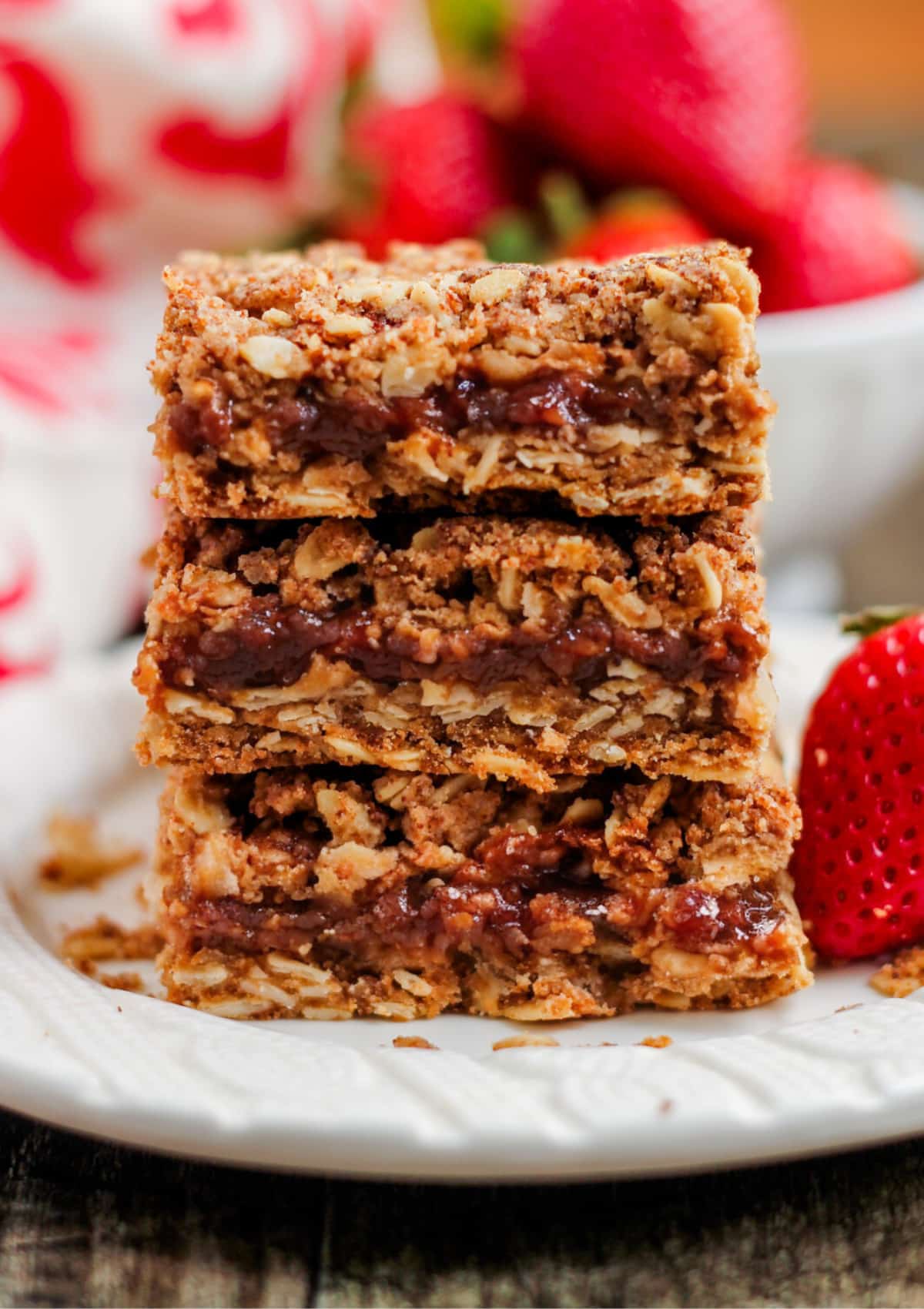 a plate of strawberry crumble bars.