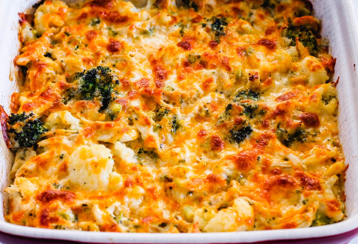 A baking dish with cheesy meal in it.