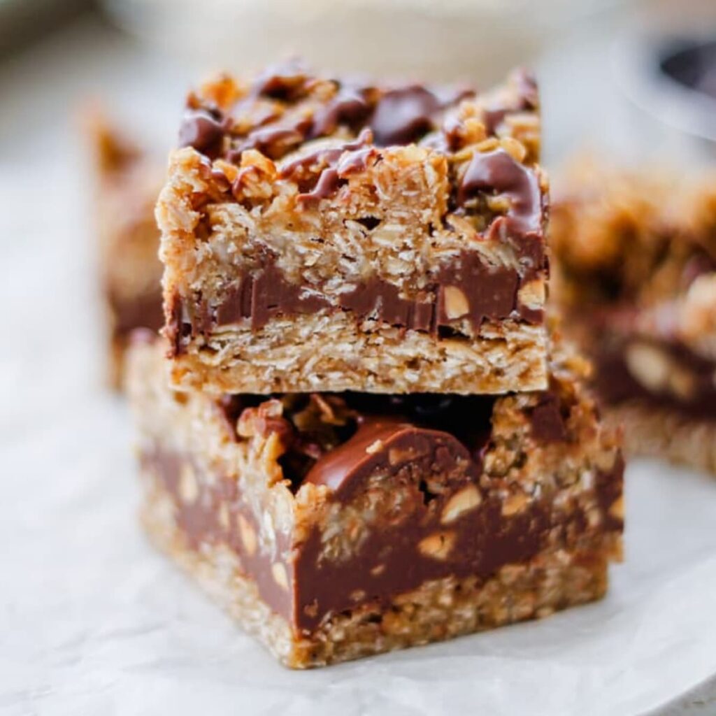A stack of chocolate peanut butter oat bars.