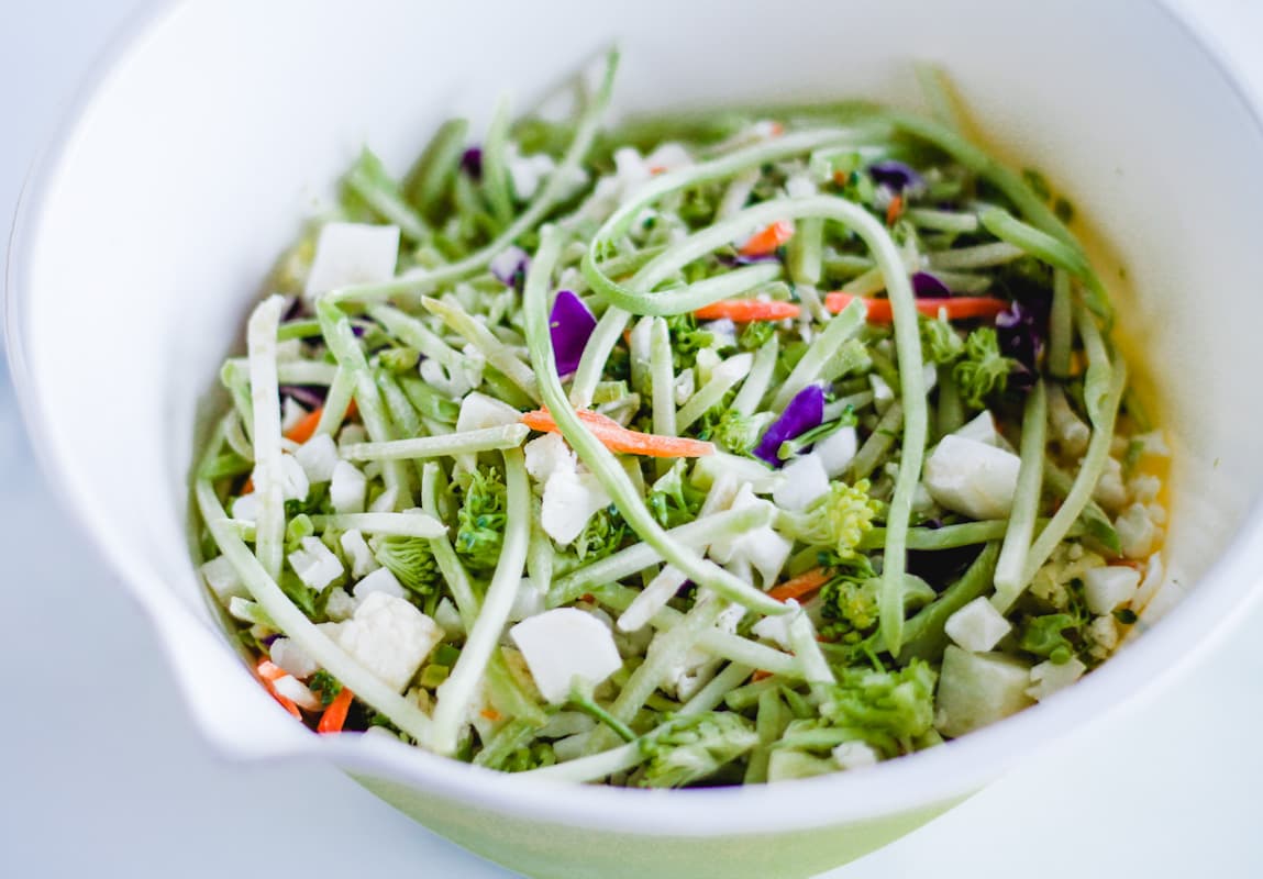 A bowl of cut vegetables