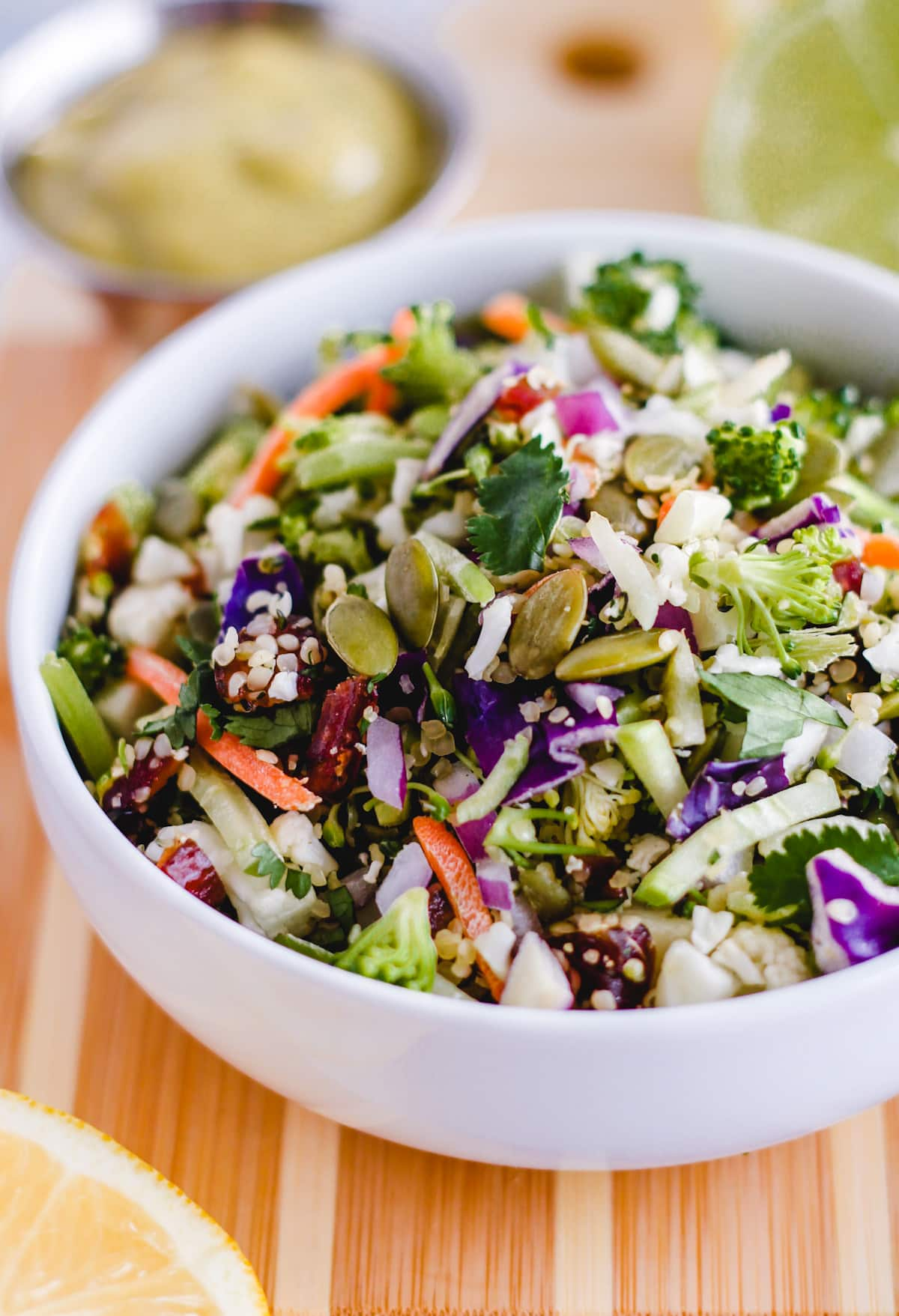 A owl of crunchy detox salad on a table.