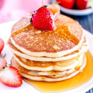 A stack of gluten free pancakes on a plate.