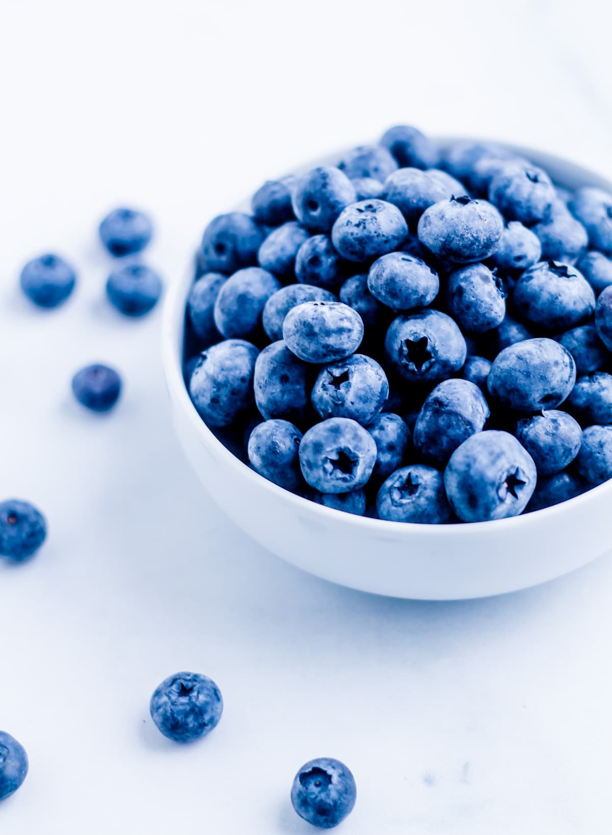 A bowl of blueberries ready to freeze.
