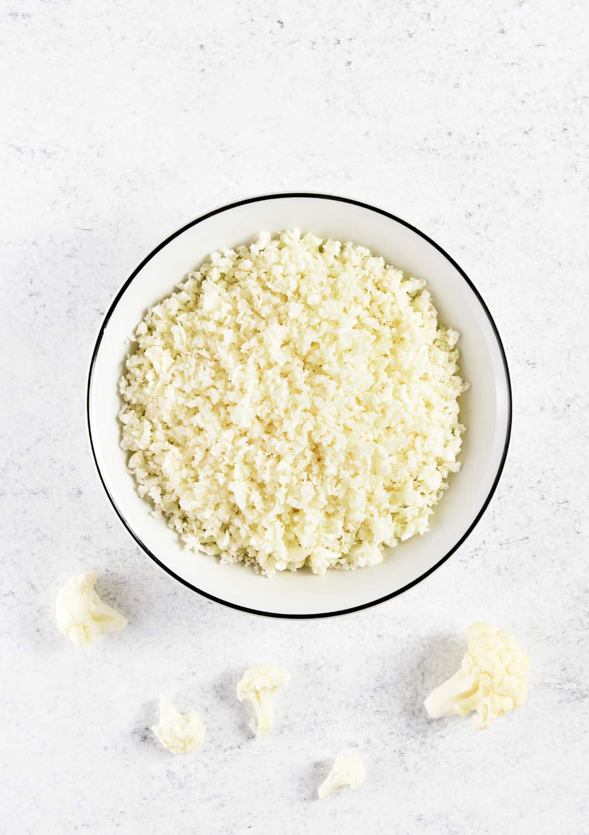 Overhead image of a bowl of cauliflower rice.