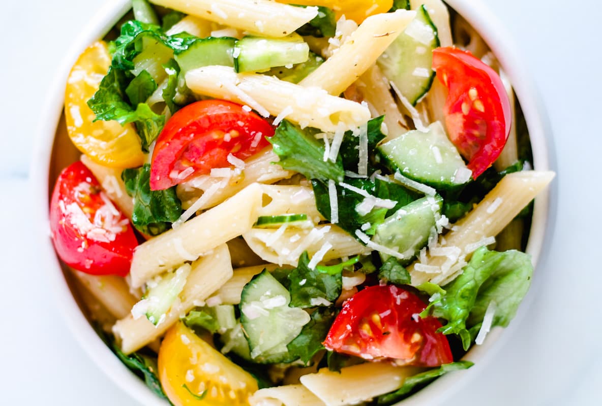 Overhead image of a pasta salad without mayonnaise in a bowl.