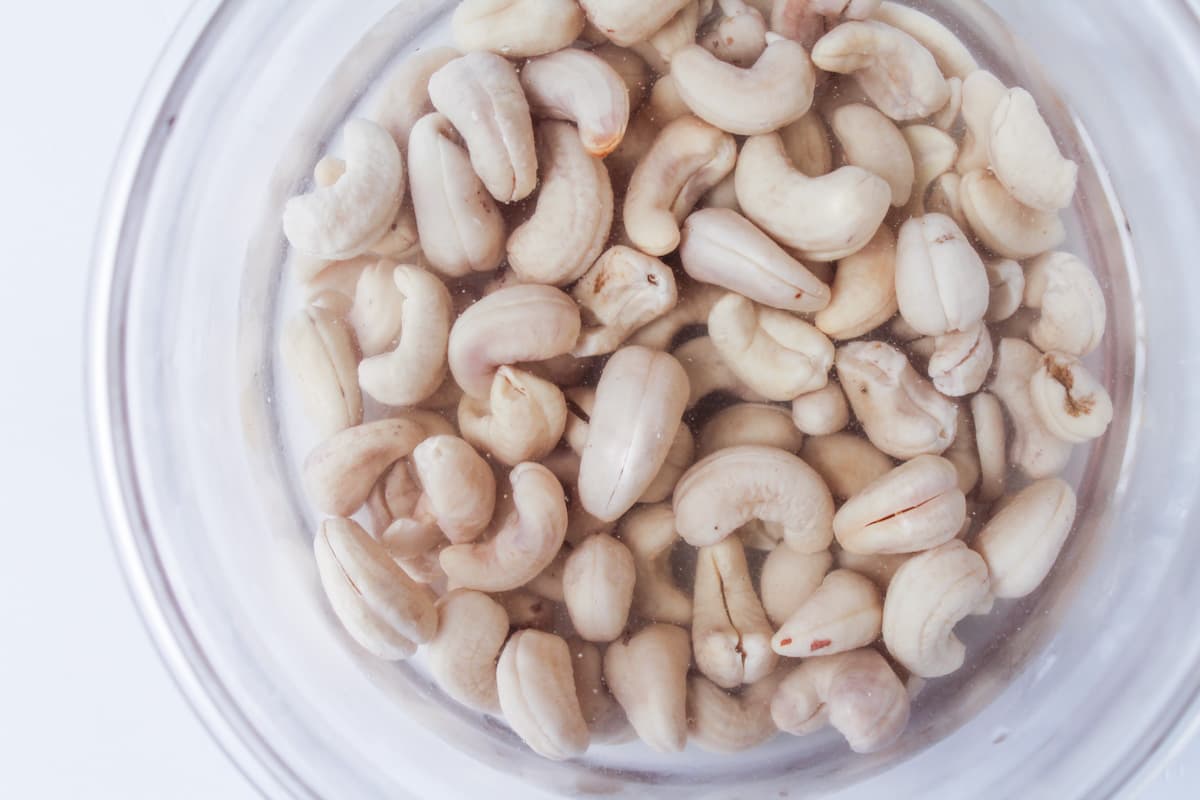 Soaked cashews in a bowl.