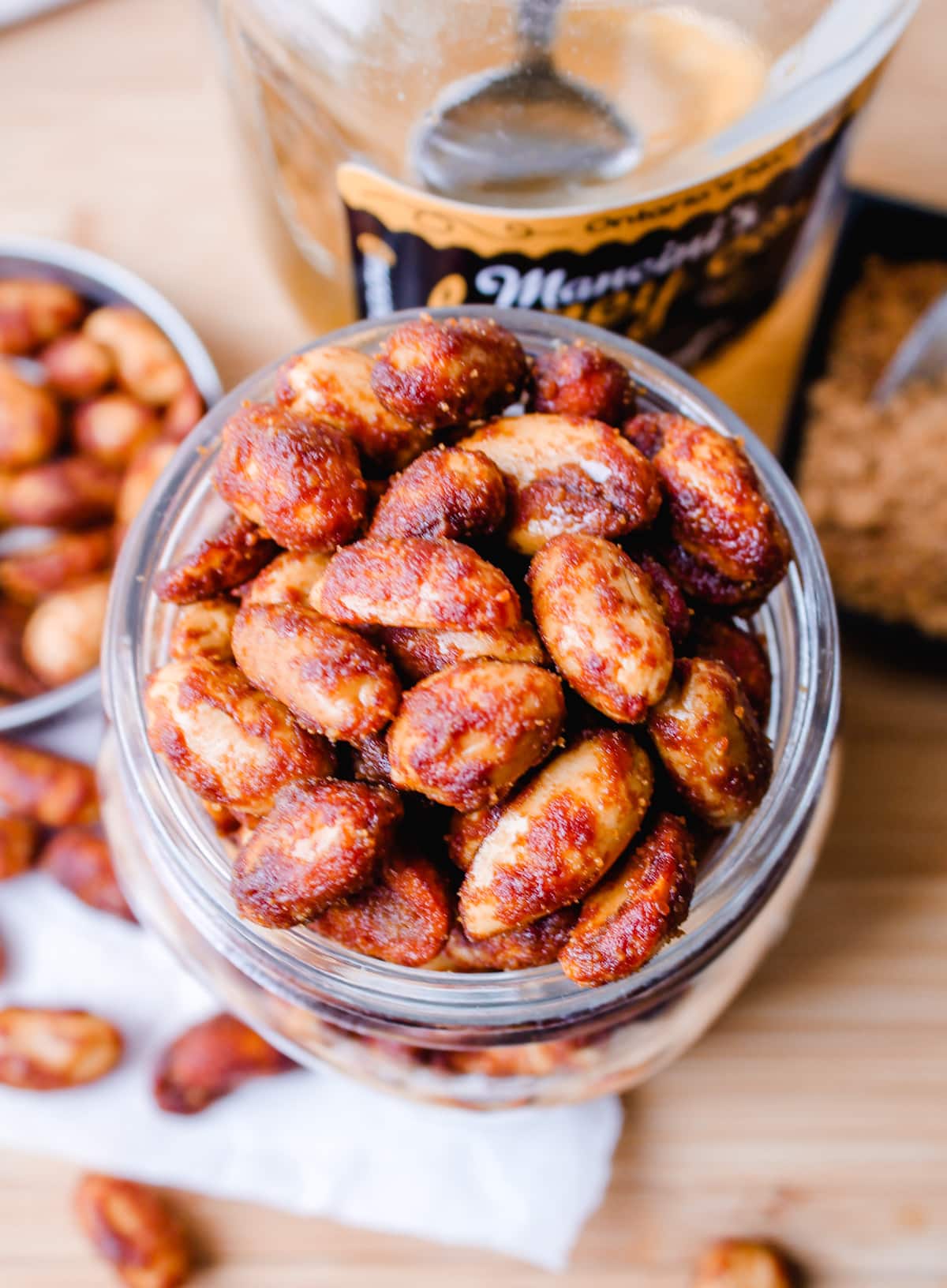 Overhead image of a jar of honey roasted peanuts.