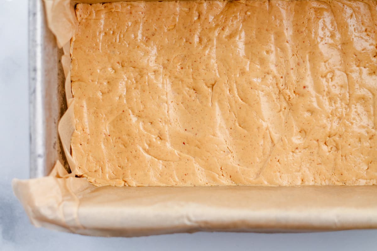 Mixture pressed into a lined baking dish.