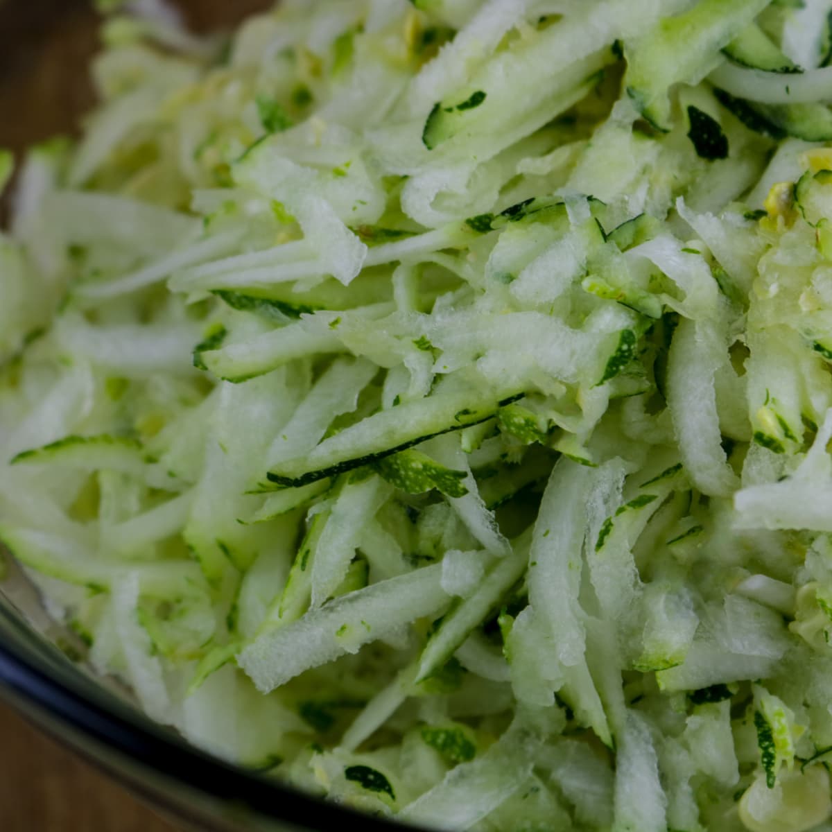 A bowl of shredded zucchini.