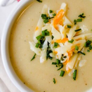A bowl of cauliflower potato soup.