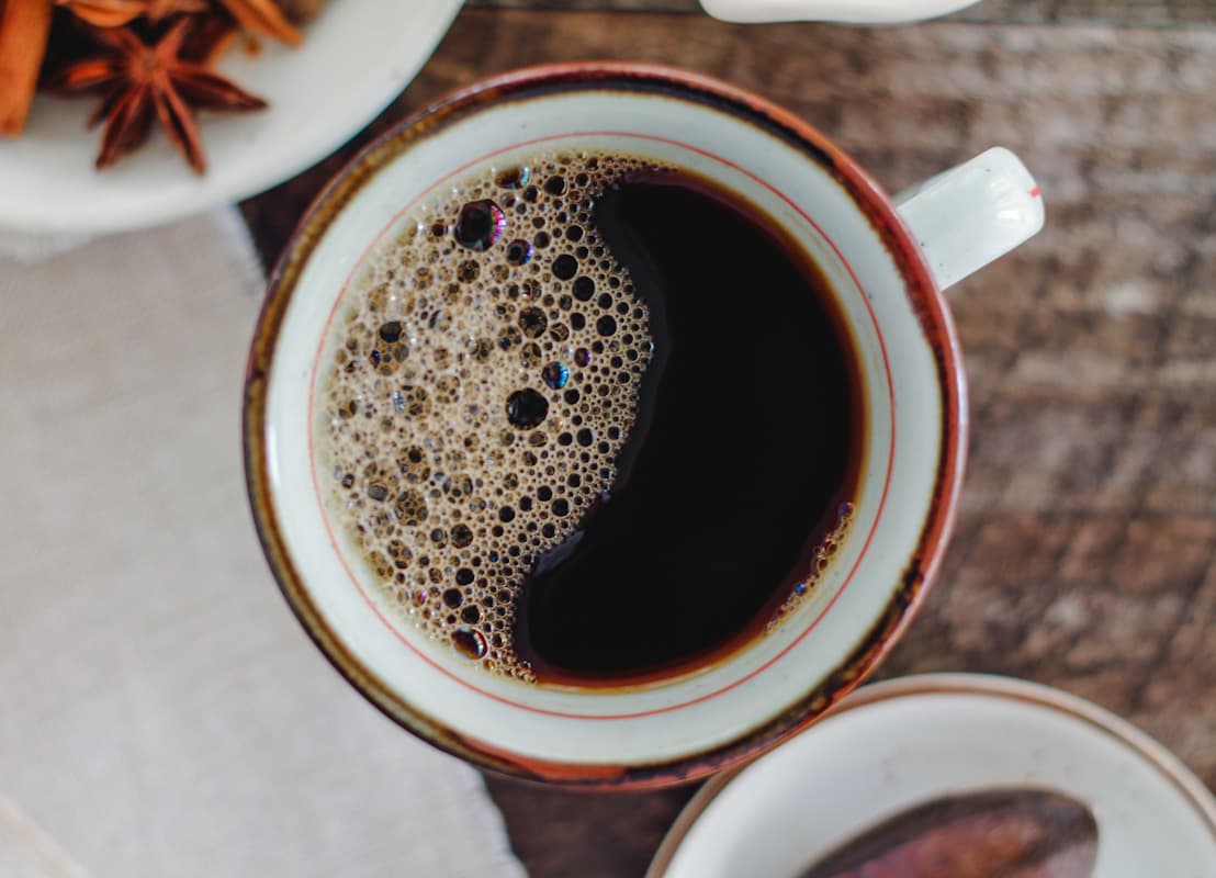 Overhead image of a mug of chai coffee.