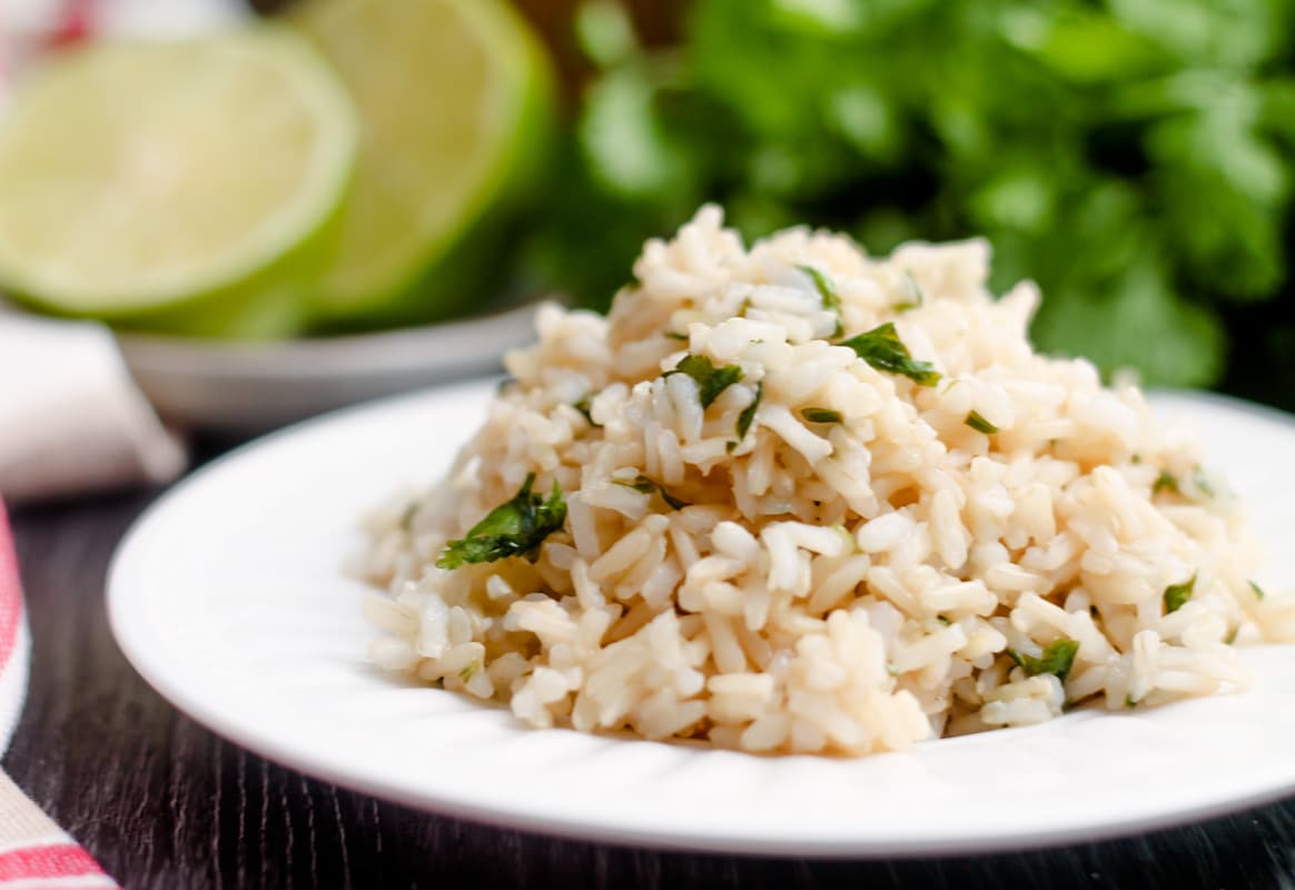 Cilantro brown rice on a plate.