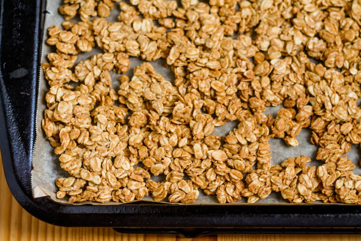 Baked granola on a sheet.